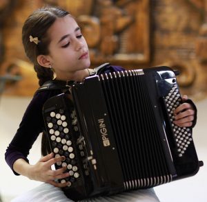 La ricerca per la didattica fisarmonicistica - bimba fisarmonica Pigini